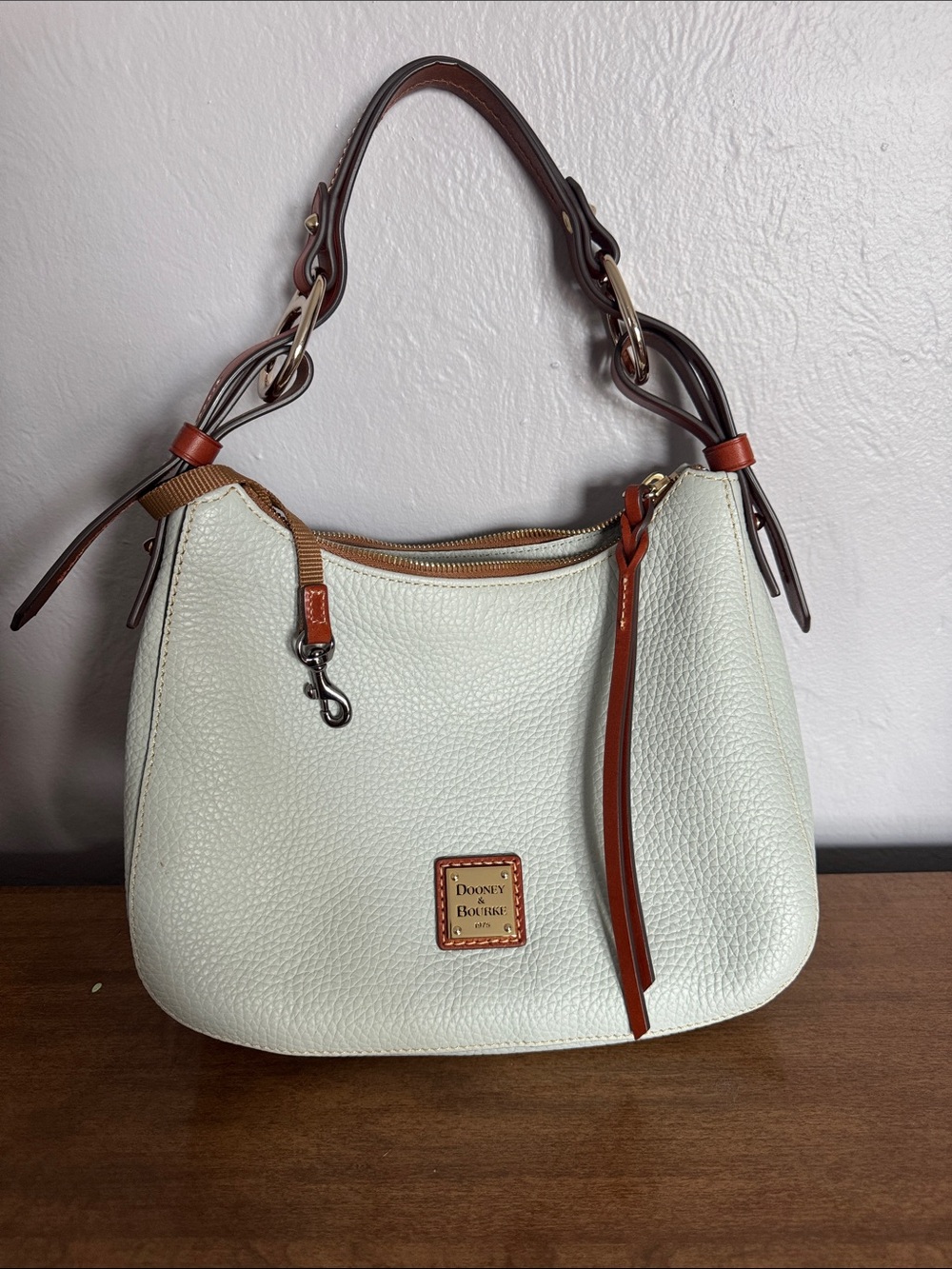 Dooney & Bourke Cream Pebble Leather Shoulder Bag with Brown Trim